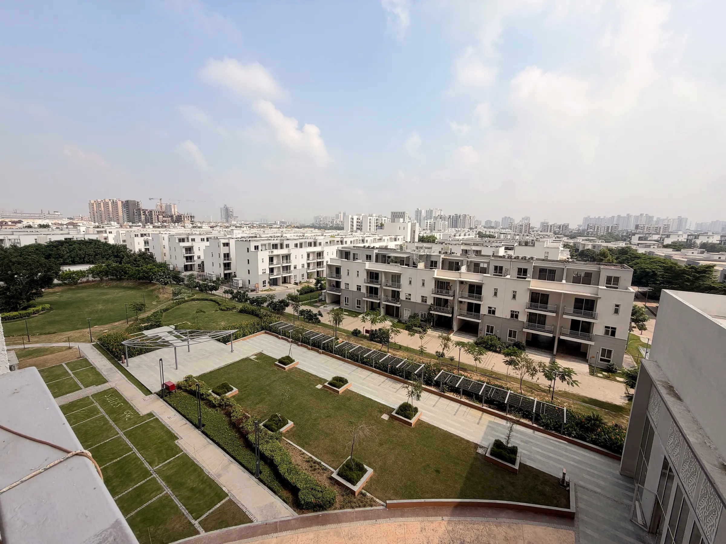 View over the landscaped gardens and low-rise villas of Godrej Golf Links